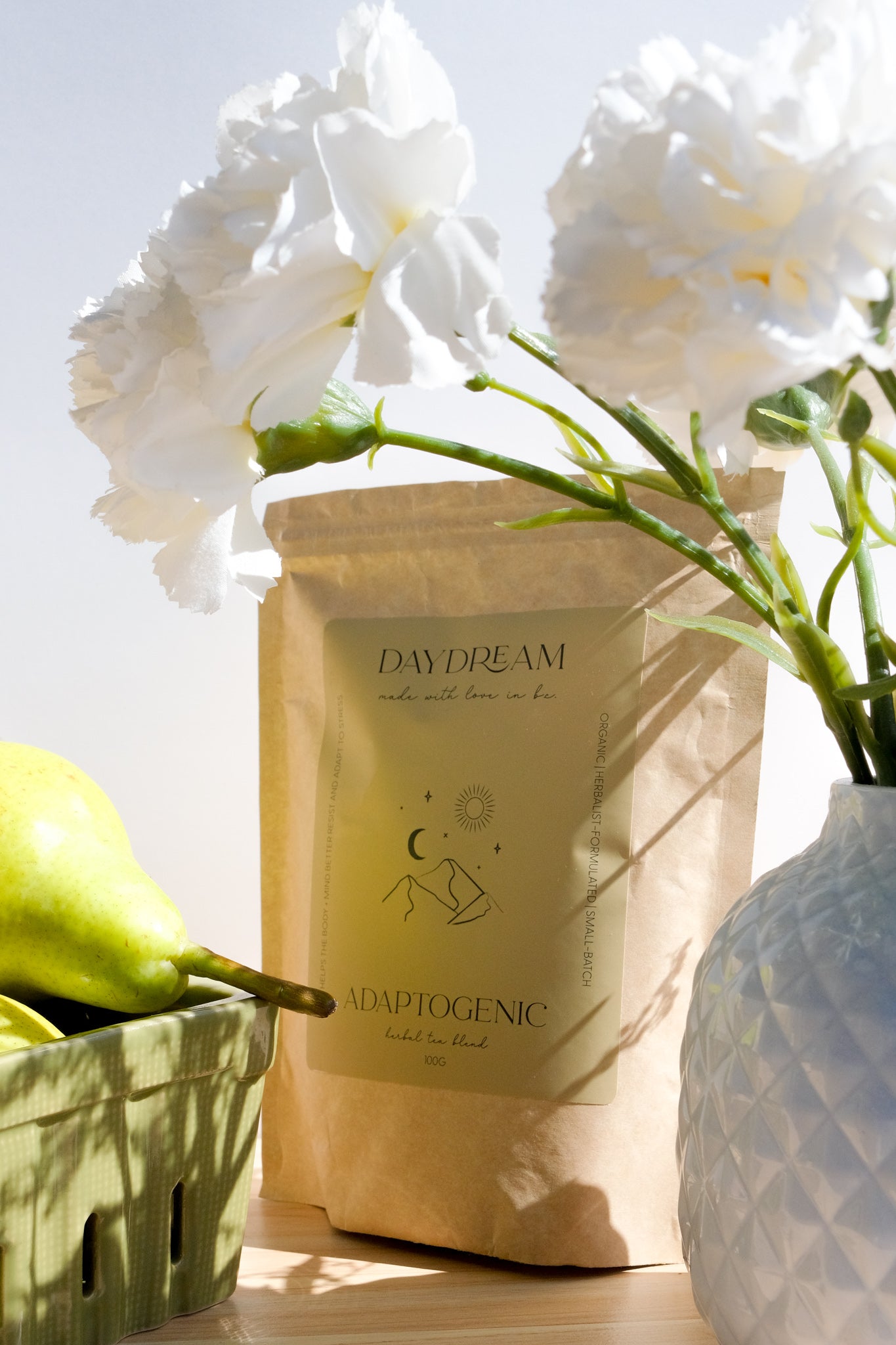 Our Adaptogenic Herbal Tea blend is a potent, grounding tea that has been crafted to help support resilience, vitality and balance throughout the mind and body. Crafted with a blend of adaptogenic herbs, this blend helps support the body's natural response to everyday stress as well as emotional wellbeing.