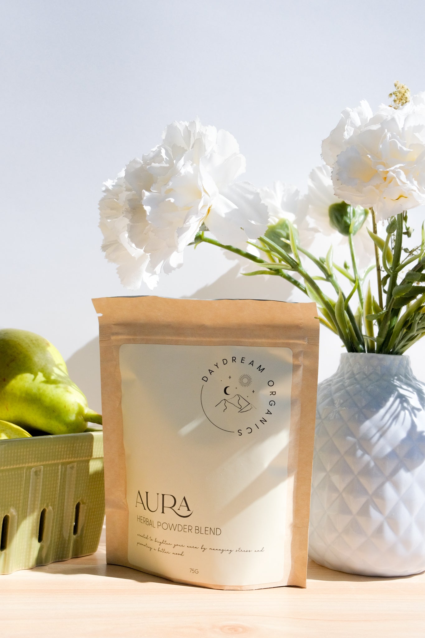 Our Aura Herbal Powder blend has been mindfully created to nurture a positive mood and promote a sense of tranquility in the mind and body.

This blends of herbs offers a gentle way to support emotional well-being and manage everyday stressors. With its soothing properties, Aura can be seamlessly incorporated into your daily routine, helping you to find a sense of balance and enhance your overall aura.&nbsp;