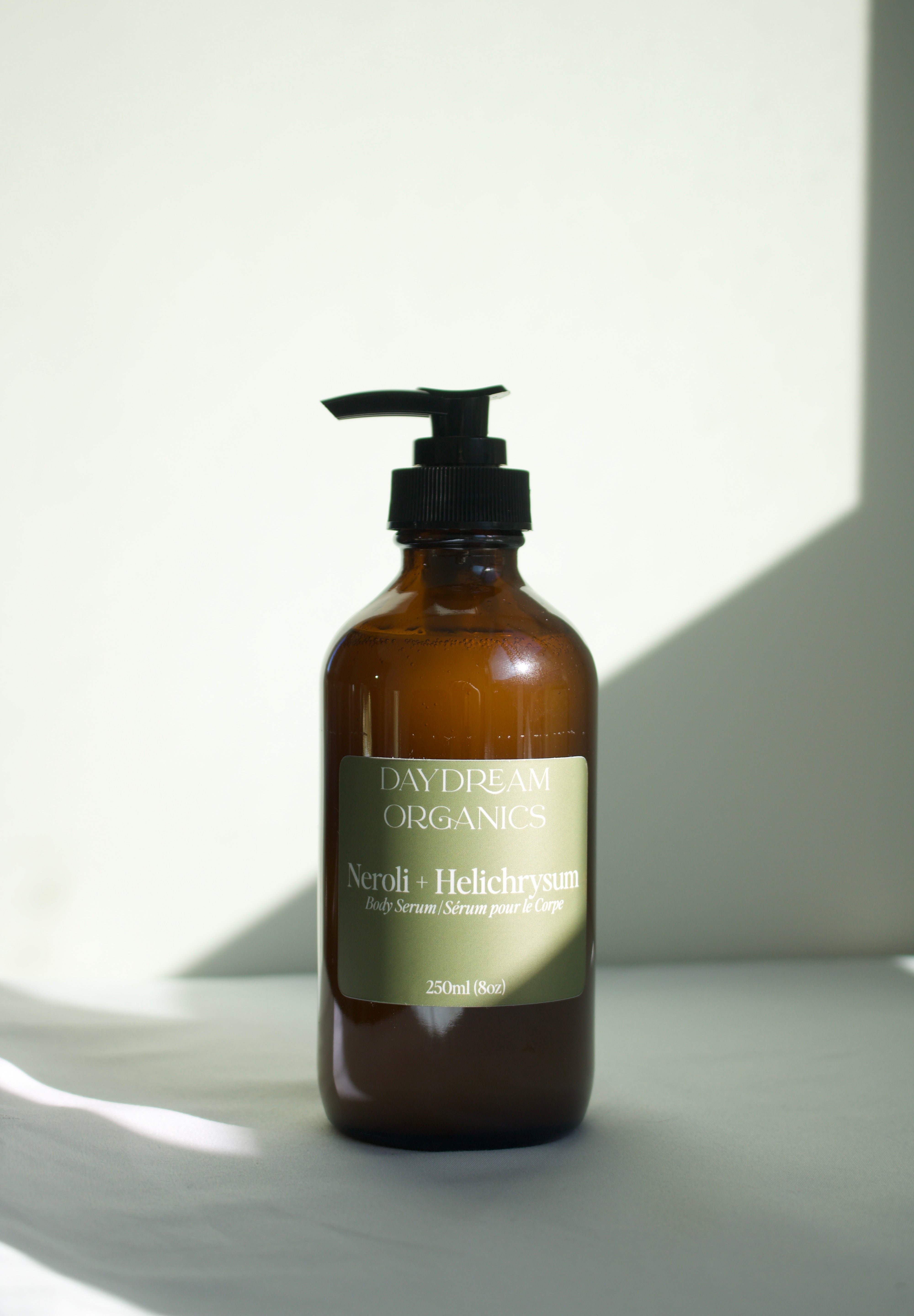 Our Body Serum is a rich, deeply nourishing natural skin treatment designed to replenish dry skin and lock in lasting moisture. Handcrafted with a blend of organic oils, butters, and waxes, this serum melts into the skin effortlessly leaving it feeling soft, smooth, and comfortably hydrated.&nbsp;