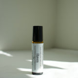 Our Haven essential oil roll-on has been created to transport you into a safe haven of your very own. This blend is serene, tranquil and sweet, creating a sense of ease, calm, and stillness - a perfect companion for quiet moments, deep breaths, and finding comfort within.