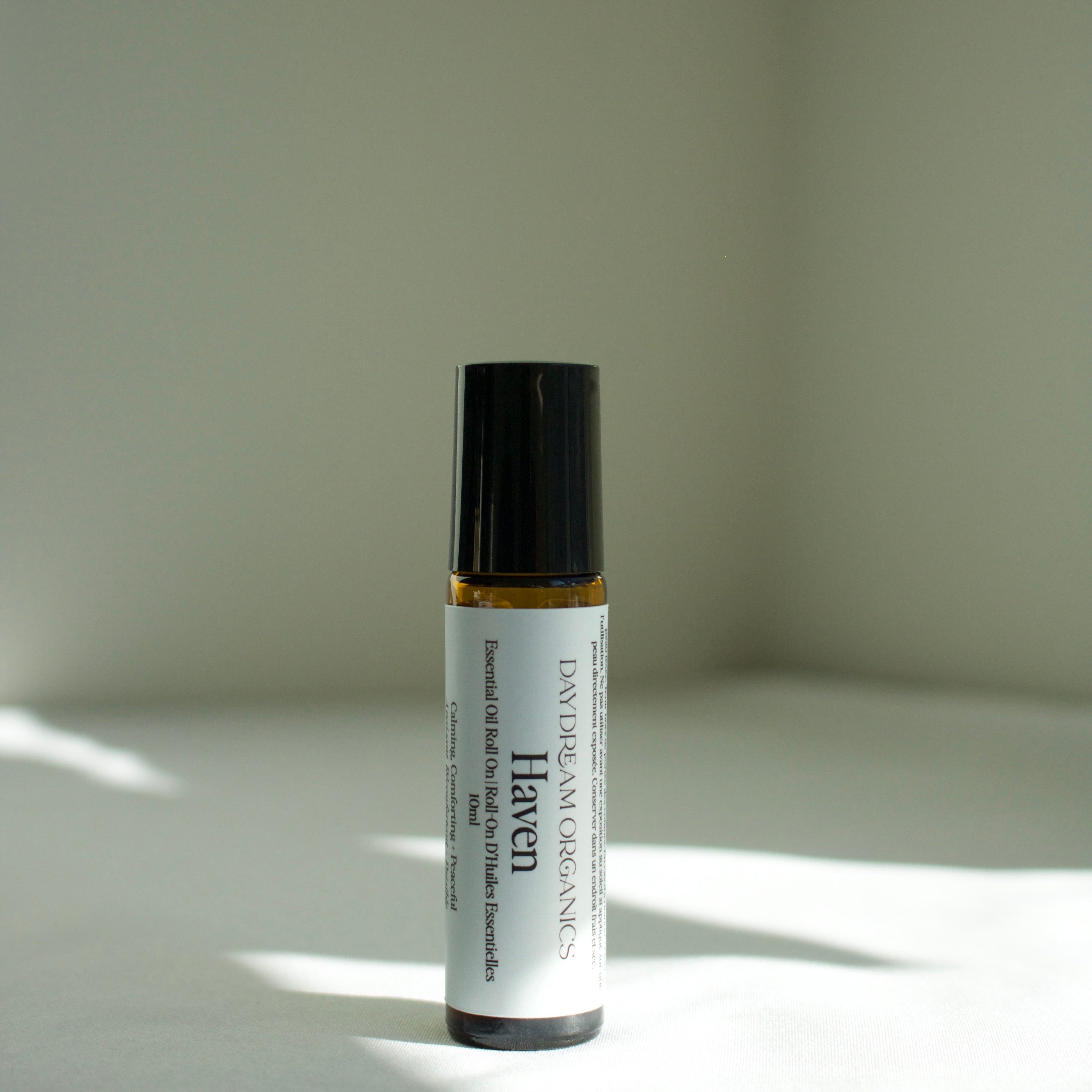Our Haven essential oil roll-on has been created to transport you into a safe haven of your very own. This blend is serene, tranquil and sweet, creating a sense of ease, calm, and stillness - a perfect companion for quiet moments, deep breaths, and finding comfort within.