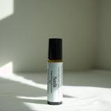 Our Sunlit perfume roll-on is bright, warm and softly grounding. Sunlit captures the feeling of golden light on skin with notes of sparkling citrus and smooth warmth. Sunlit is a balanced scent that is both uplifting and deeply comforting - like liquid sunshine.
